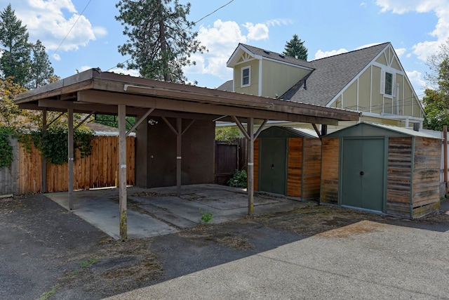 3308 W Kiernan Ave, Spokane, WA 99205 - garage featuring a shed and a carport