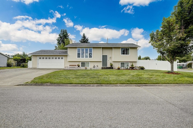 18306 E 3rd Ave, Greenacres, WA 99016 - split foyer home with driveway, a garage, and a chimney