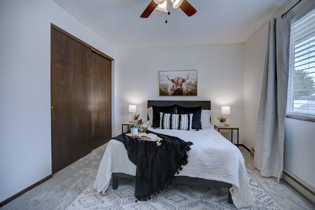 18306 E 3rd Ave, Greenacres, WA 99016 - bedroom featuring light carpet, multiple windows, and a closet