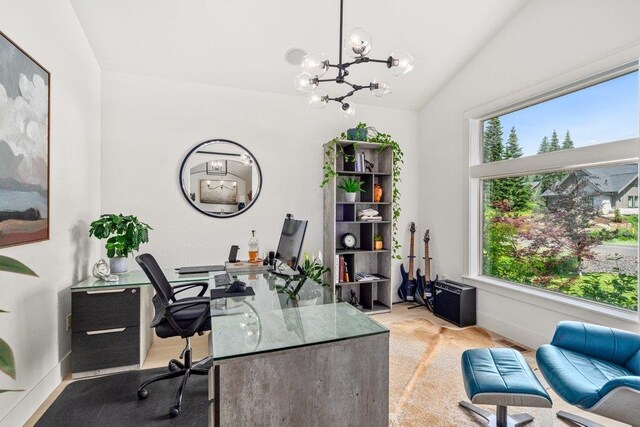 3742 W Cielo View Ct, Coeur D Alene, ID 83814 - office area featuring plenty of natural light, a chandelier, vaulted ceiling, and light colored carpet