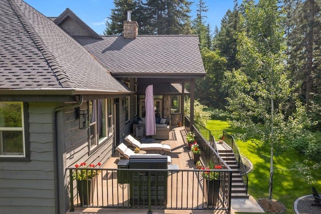 3742 W Cielo View Ct, Coeur D Alene, ID 83814 - view of side of property with stairs, a shingled roof, a chimney, and a lawn