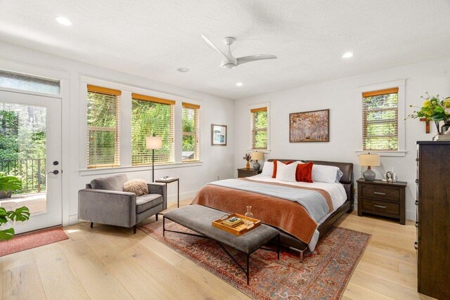 3742 W Cielo View Ct, Coeur D Alene, ID 83814 - bedroom featuring access to exterior, light wood finished floors, recessed lighting, and ceiling fan