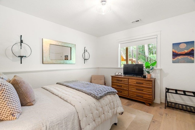 3742 W Cielo View Ct, Coeur D Alene, ID 83814 - bedroom featuring wood finished floors