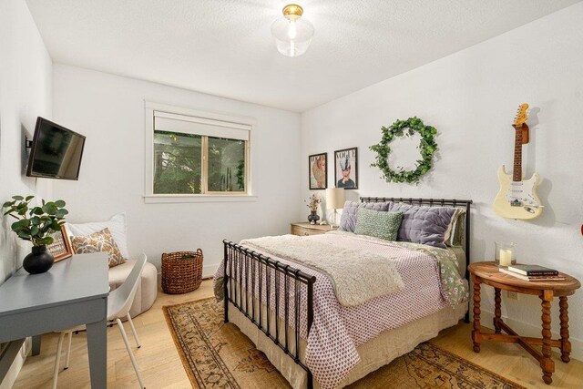3742 W Cielo View Ct, Coeur D Alene, ID 83814 - bedroom featuring wood finished floors