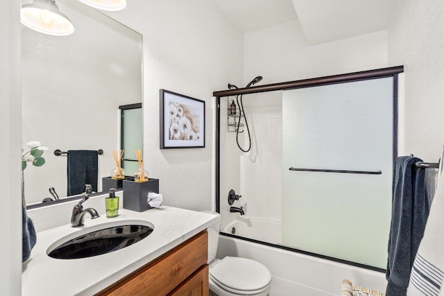 3742 W Cielo View Ct, Coeur D Alene, ID 83814 - bathroom with vanity, combined bath / shower with glass door, and a textured wall