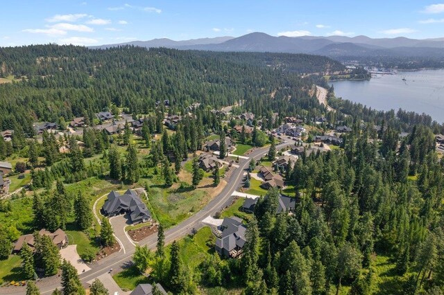 3742 W Cielo View Ct, Coeur D Alene, ID 83814 - aerial overview of property's location featuring a heavily wooded area and a water and mountain view