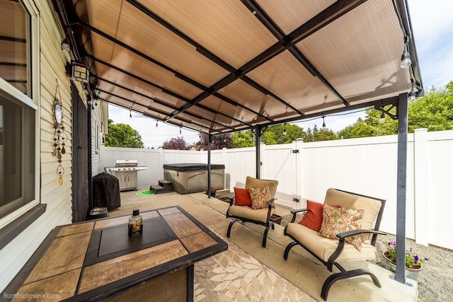 4128 E 22nd Ave, Spokane, WA 99223 - fenced backyard with a hot tub, a patio area, and an outdoor living space
