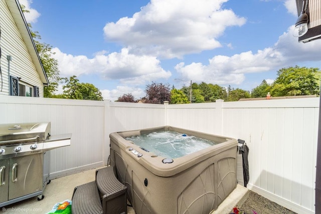 4128 E 22nd Ave, Spokane, WA 99223 - view of patio / terrace with a hot tub and area for grilling