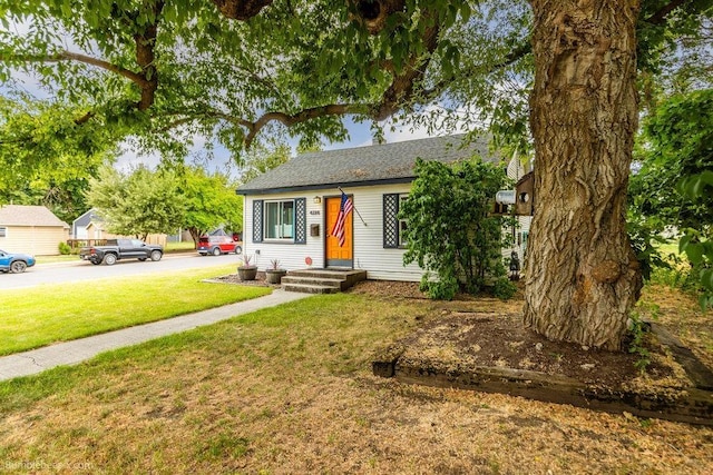 4128 E 22nd Ave, Spokane, WA 99223 - view of front of property featuring a front lawn and a shingled roof