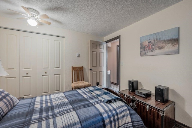 6821 N Hamilton St Unit 1, Spokane, WA 99208 - bedroom with a closet, a textured ceiling, and a ceiling fan