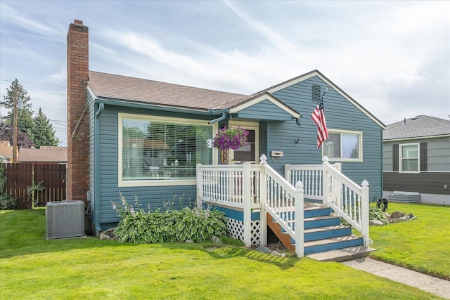 3623 W Longfellow Ave, Spokane, WA 99205 - view of front facade featuring a chimney and a shingled roof