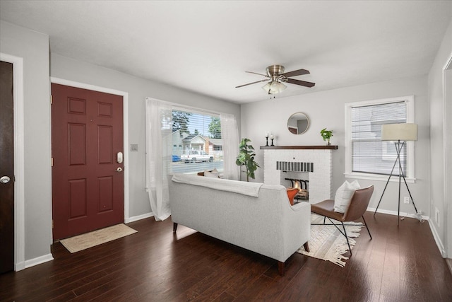 3623 W Longfellow Ave, Spokane, WA 99205 - living room with a ceiling fan, a fireplace, and wood finished floors