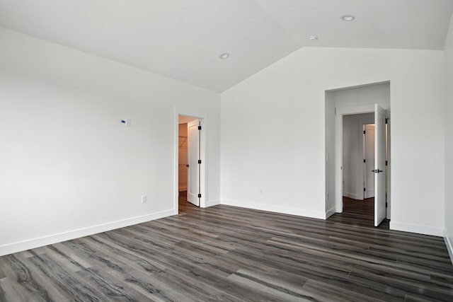 11208 E Rimrock Ln, Spokane Valley, WA 99206 - spare room featuring lofted ceiling and dark wood-style flooring