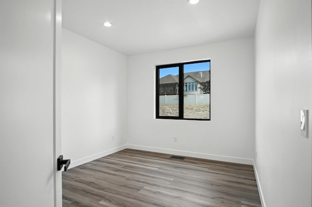 11208 E Rimrock Ln, Spokane Valley, WA 99206 - empty room with wood finished floors and recessed lighting