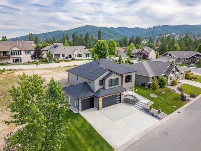 11208 E Rimrock Ln, Spokane Valley, WA 99206 - aerial view of residential area with mountains