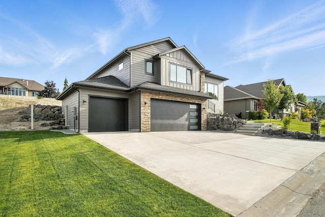 11208 E Rimrock Ln, Spokane Valley, WA 99206 - contemporary house featuring driveway, an attached garage, a front yard, and stone siding