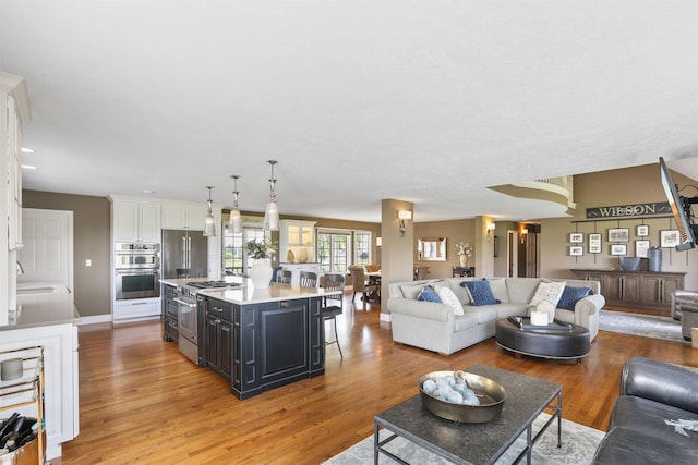 2804 W Johannsen Rd, Spokane, WA 99208 - living room featuring light wood-style flooring and baseboards