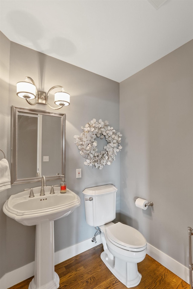 2804 W Johannsen Rd, Spokane, WA 99208 - half bath featuring toilet and wood finished floors