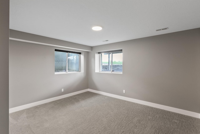2804 W Johannsen Rd, Spokane, WA 99208 - unfurnished room with dark colored carpet and baseboards