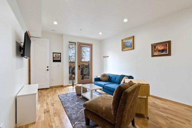 2435 W Riverside Ave, Spokane, WA 99201 - living room with light wood finished floors and recessed lighting