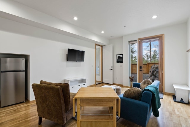2435 W Riverside Ave, Spokane, WA 99201 - living room with light wood-type flooring and recessed lighting
