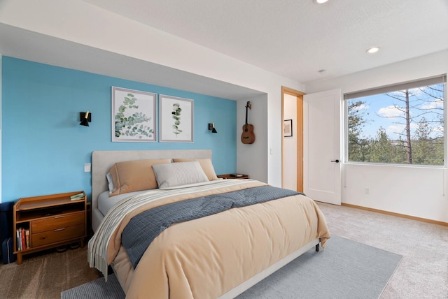2435 W Riverside Ave, Spokane, WA 99201 - carpeted bedroom with baseboards and recessed lighting