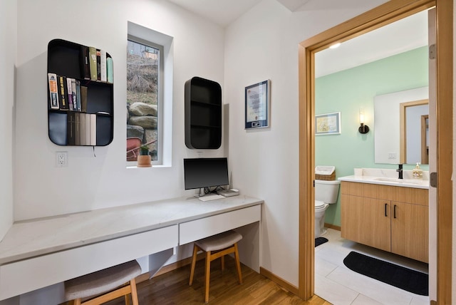 2435 W Riverside Ave, Spokane, WA 99201 - office area with a sink and light wood-type flooring