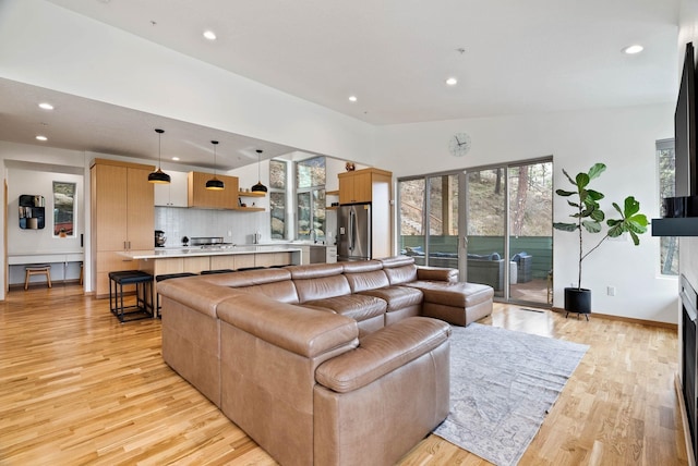 2435 W Riverside Ave, Spokane, WA 99201 - living area with recessed lighting and light wood-type flooring