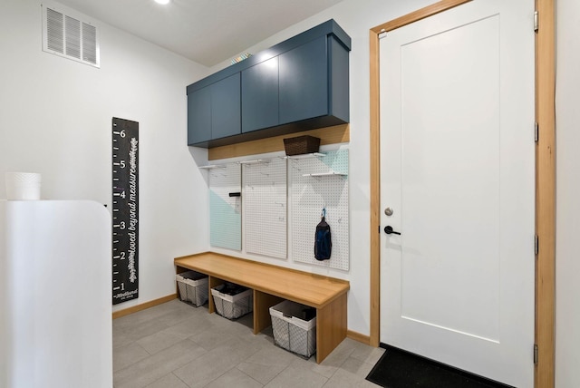 2435 W Riverside Ave, Spokane, WA 99201 - mudroom with light tile patterned floors and baseboards
