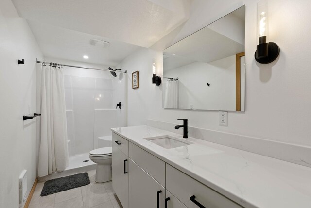 2435 W Riverside Ave, Spokane, WA 99201 - bathroom featuring vanity, a shower with shower curtain, and tile patterned flooring