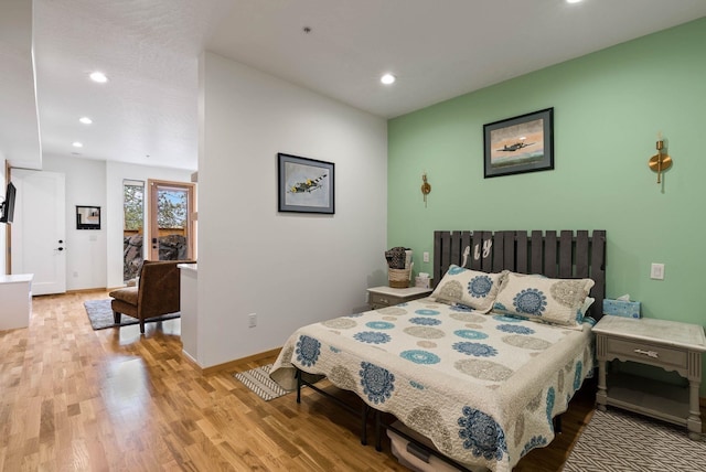 2435 W Riverside Ave, Spokane, WA 99201 - bedroom featuring light wood-style flooring and recessed lighting