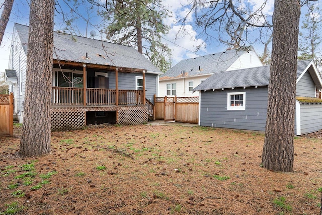 107 E 29th Ave, Spokane, WA 99203 - rear view of house featuring a deck and roof with shingles