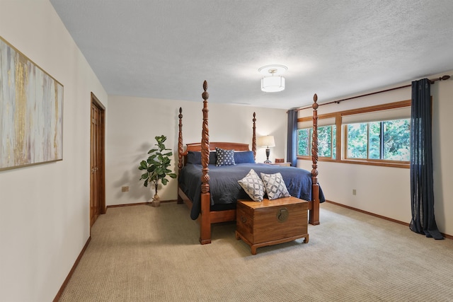 339 W Wilson Ave, Spokane, WA 99208 - bedroom with light carpet and a textured ceiling