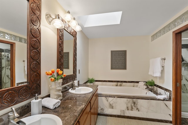 339 W Wilson Ave, Spokane, WA 99208 - bathroom featuring a skylight, a bath, and double vanity