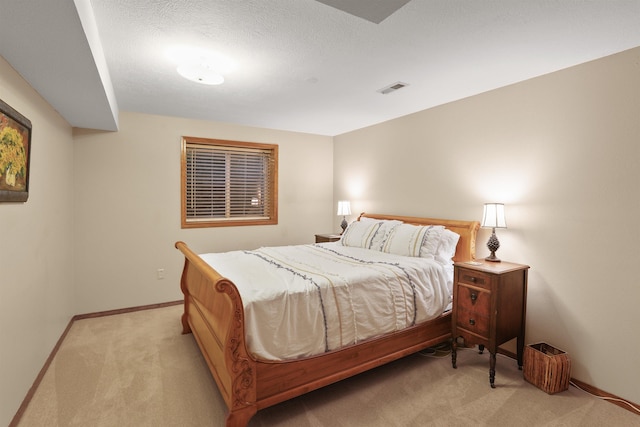 339 W Wilson Ave, Spokane, WA 99208 - bedroom with light carpet and baseboards