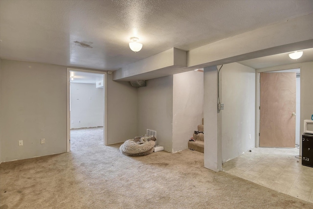2804 E Marshall Ave, Spokane, WA 99207 - finished basement with stairs, carpet flooring, and a textured ceiling