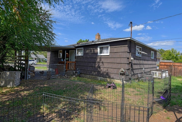 2804 E Marshall Ave, Spokane, WA 99207 - back of property with a chimney