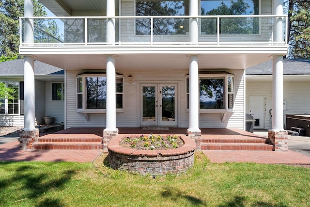 4311 W Center Ln, Spokane, WA 99208 - doorway to property with french doors, a balcony, and roof with shingles