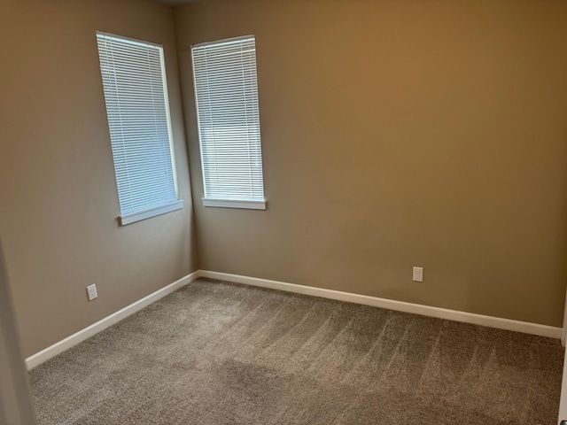 8404 N Summerhill Ln, Spokane, WA 99208 - unfurnished room featuring carpet and baseboards