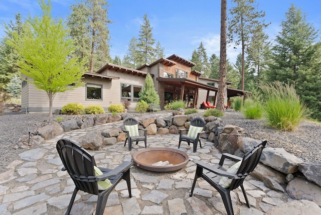 25204 N Lords Ln, Chattaroy, WA 99003 - view of patio / terrace featuring an outdoor fire pit
