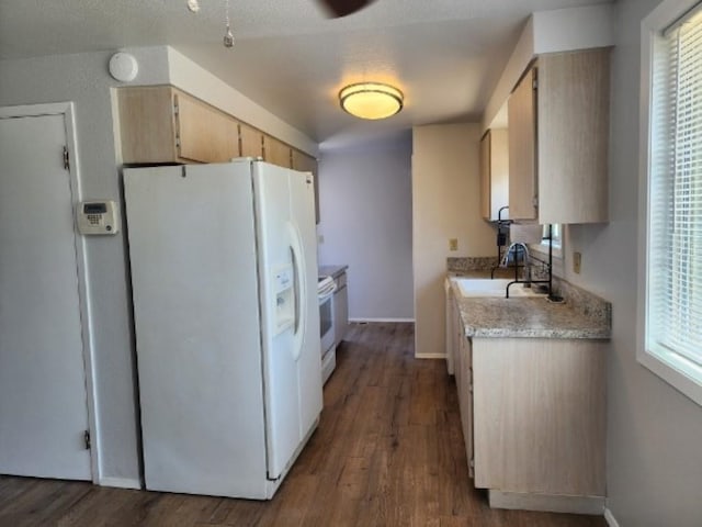 704 E Beacon Ave, Spokane, WA 99208 - kitchen with white appliances, light countertops, and wood finished floors