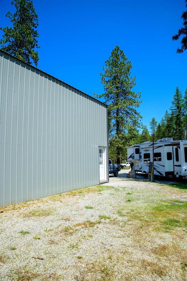 191 Amherst Ln, Newport, WA 99156 - view of property exterior with a pole building and an outbuilding