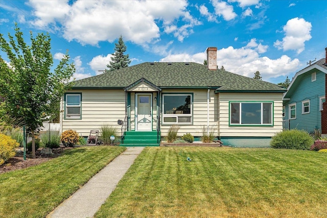 2338 W Euclid Ave, Spokane, WA 99205 - bungalow-style house with a chimney, a front yard, and roof with shingles