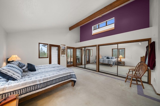 21407 W Baker Rd, Cheney, WA 99004 - carpeted bedroom with multiple closets, high vaulted ceiling, and beam ceiling