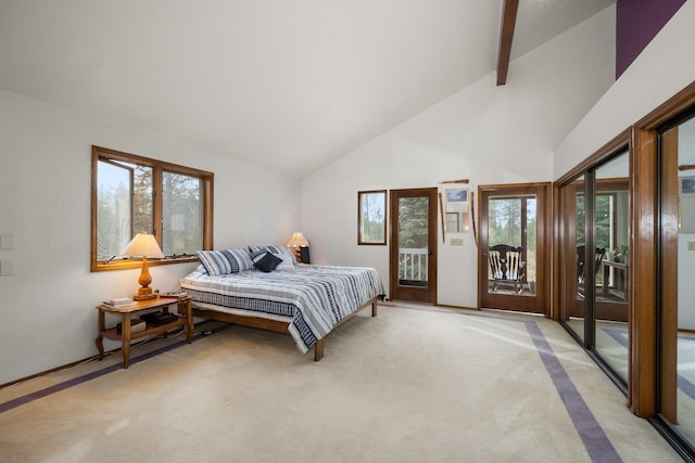 21407 W Baker Rd, Cheney, WA 99004 - bedroom with access to outside, light carpet, high vaulted ceiling, and beamed ceiling