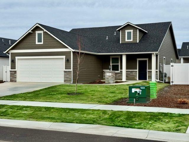 1321 E 12th St, Deer Park, WA 99006 - view of front of home featuring concrete driveway and a porch