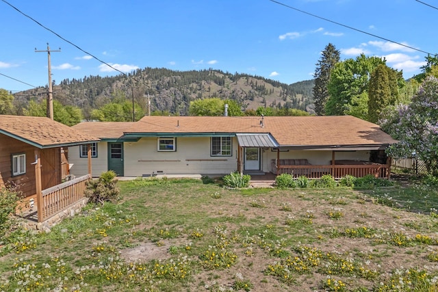 150 E 9th Ave, Kettle Falls, WA 99141 - rear view of property featuring a mountain view