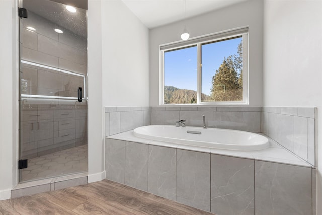 11625 N Alberta Ln, Spokane, WA 99218 - full bathroom with a garden tub, a stall shower, and wood finished floors