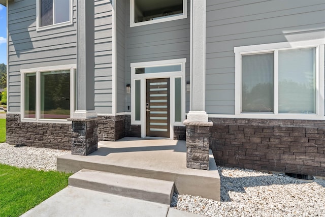 11625 N Alberta Ln, Spokane, WA 99218 - view of exterior entry featuring stone siding