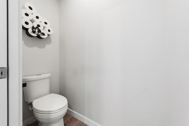 11625 N Alberta Ln, Spokane, WA 99218 - bathroom featuring baseboards and wood finished floors